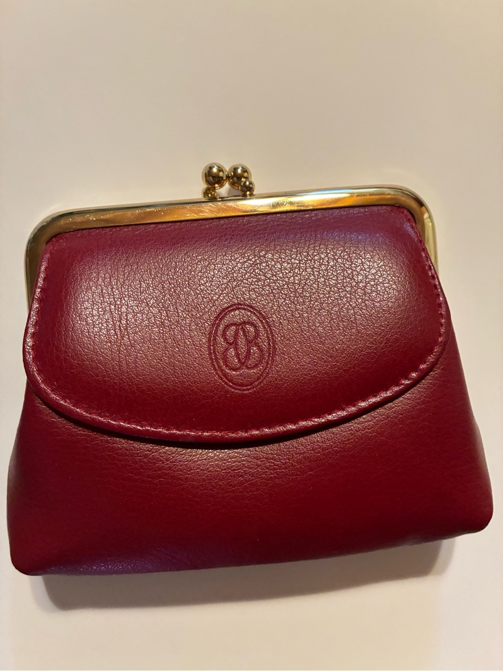 Buxton Wine Red Leather Kiss-Lock Coin Purse with Gold Frame